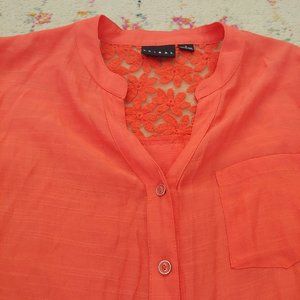 Beautifully detailed coral tunic length blouse